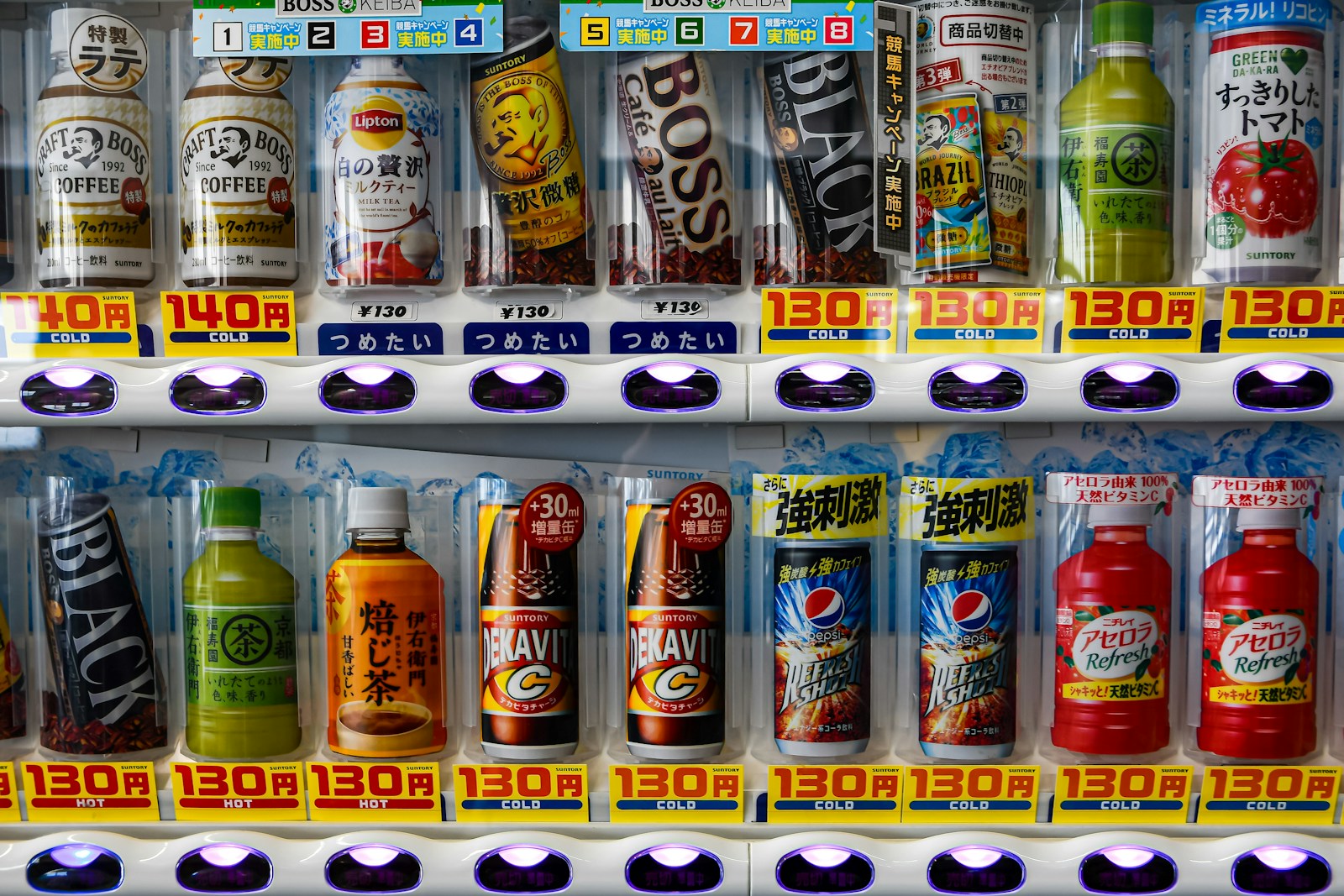 A vending machine filled with lots of different types of drinks